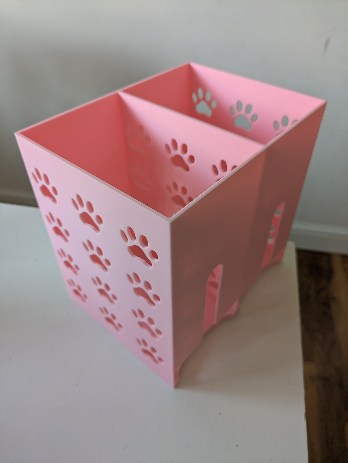 Double size pet food pouch holder & dispenser with paw prints on sides