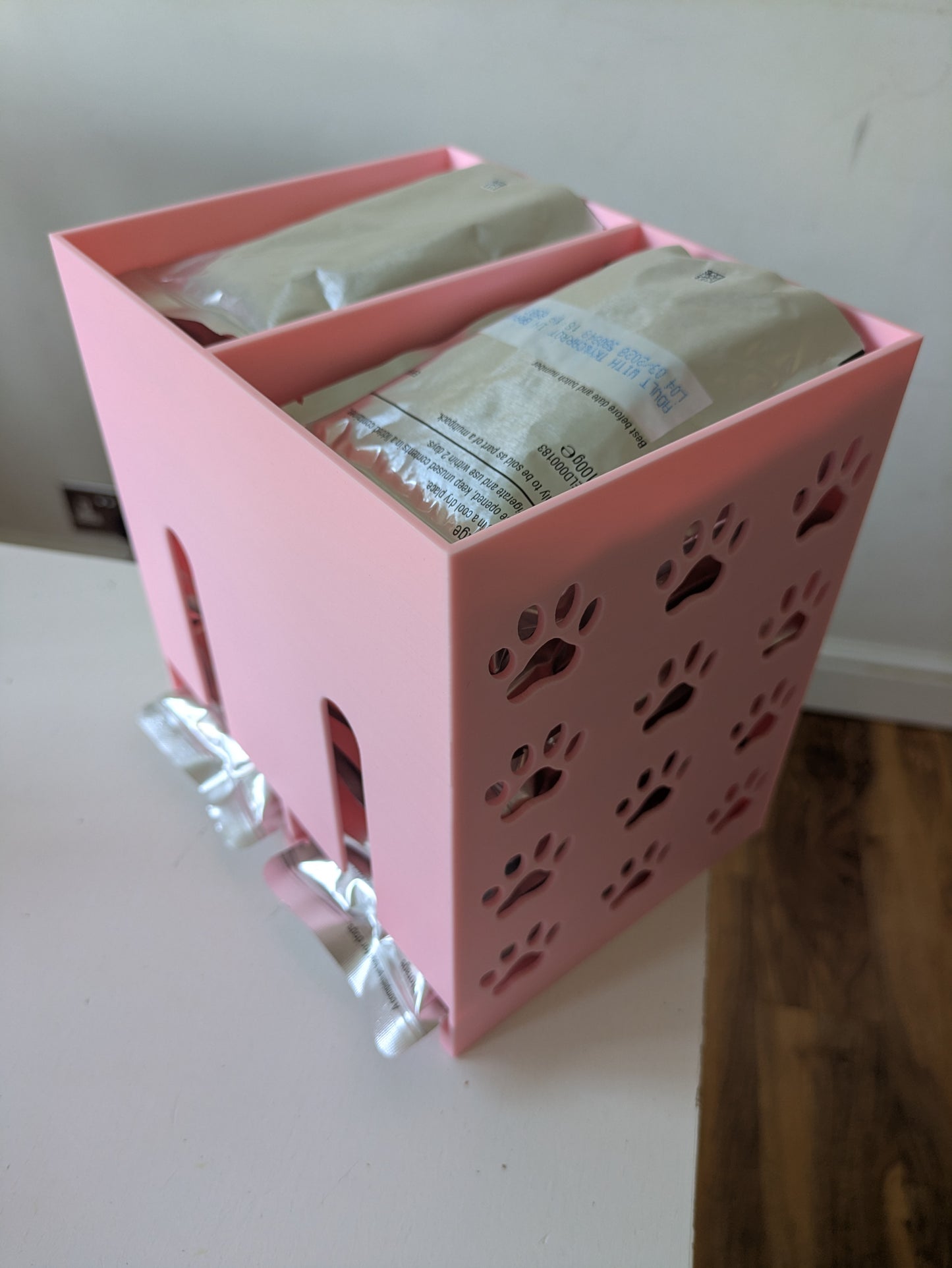 Double size pet food pouch holder & dispenser with paw prints on sides