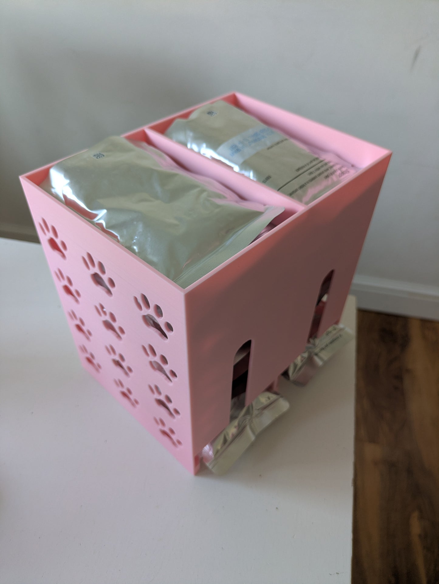 Double size pet food pouch holder & dispenser with paw prints on sides