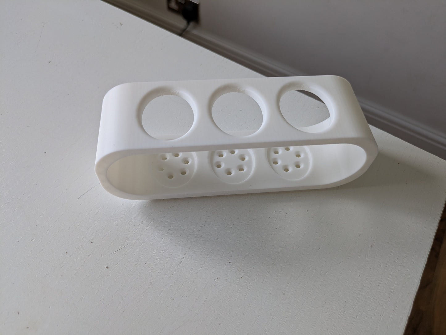 Toothbrush holder for 3 Oral B electric toothbrushes