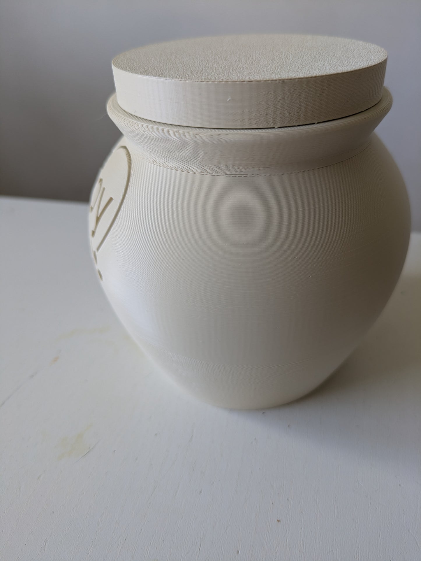 Pet cremation urn