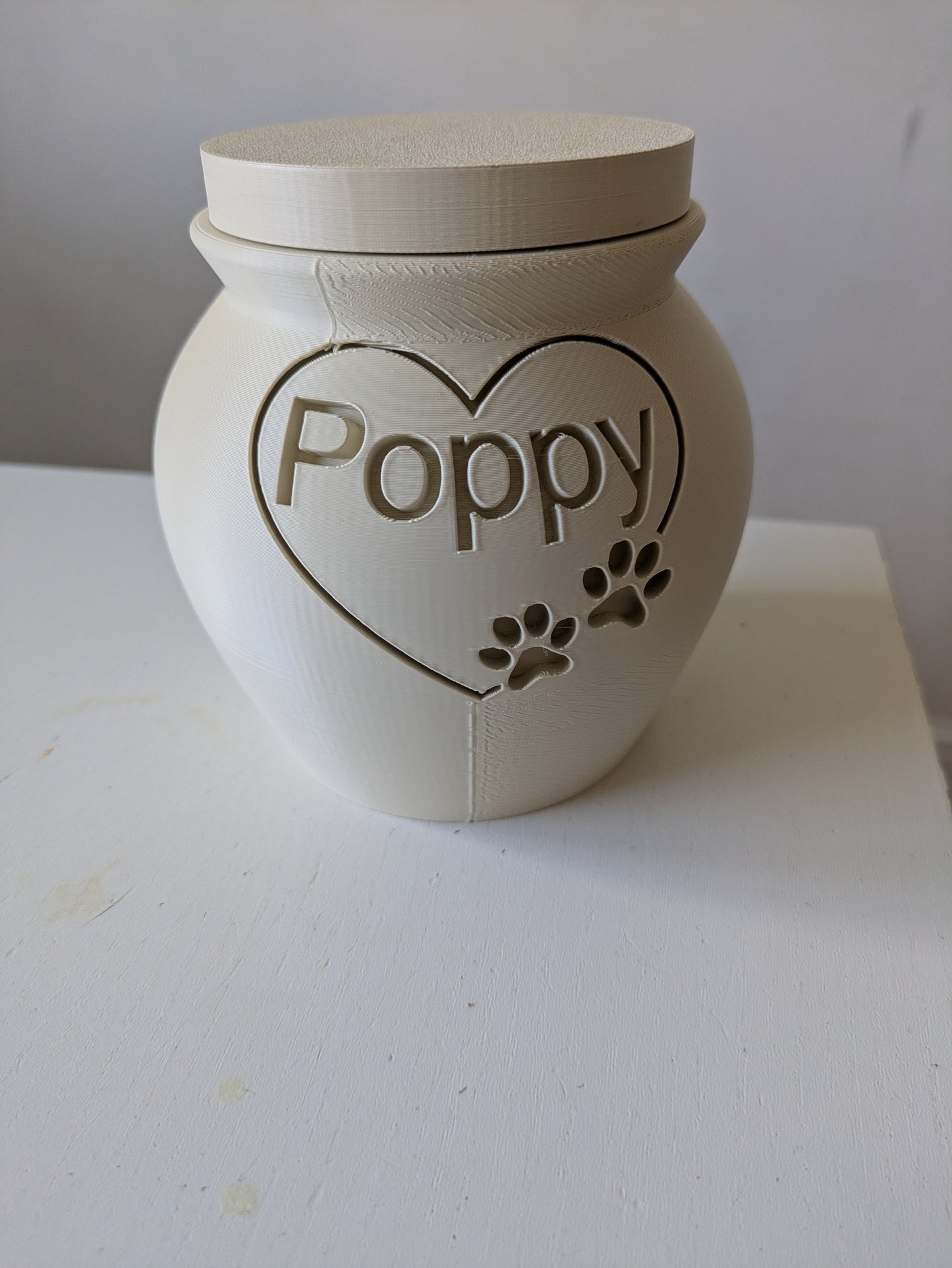 Pet cremation urn