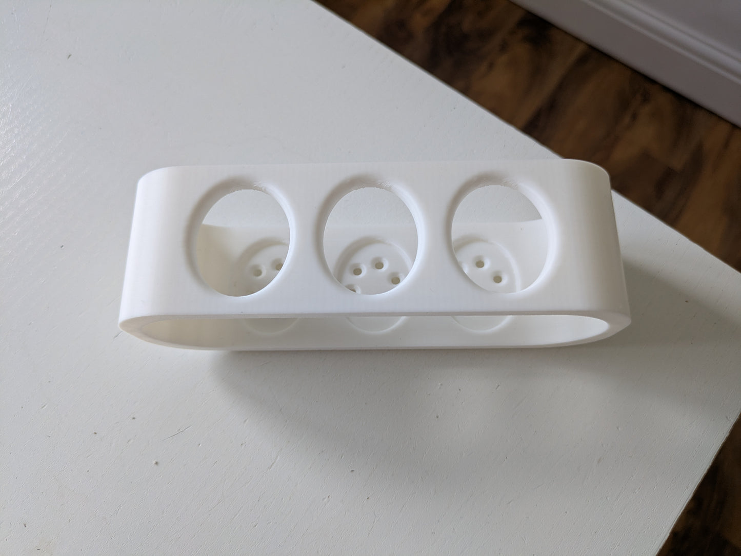 Toothbrush holder for 3 Oral B electric toothbrushes